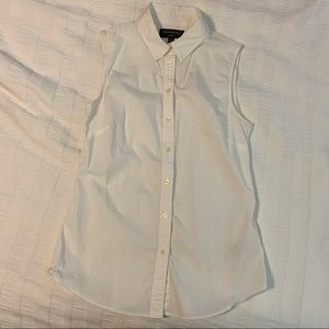 Sleeveless button front collared shirt